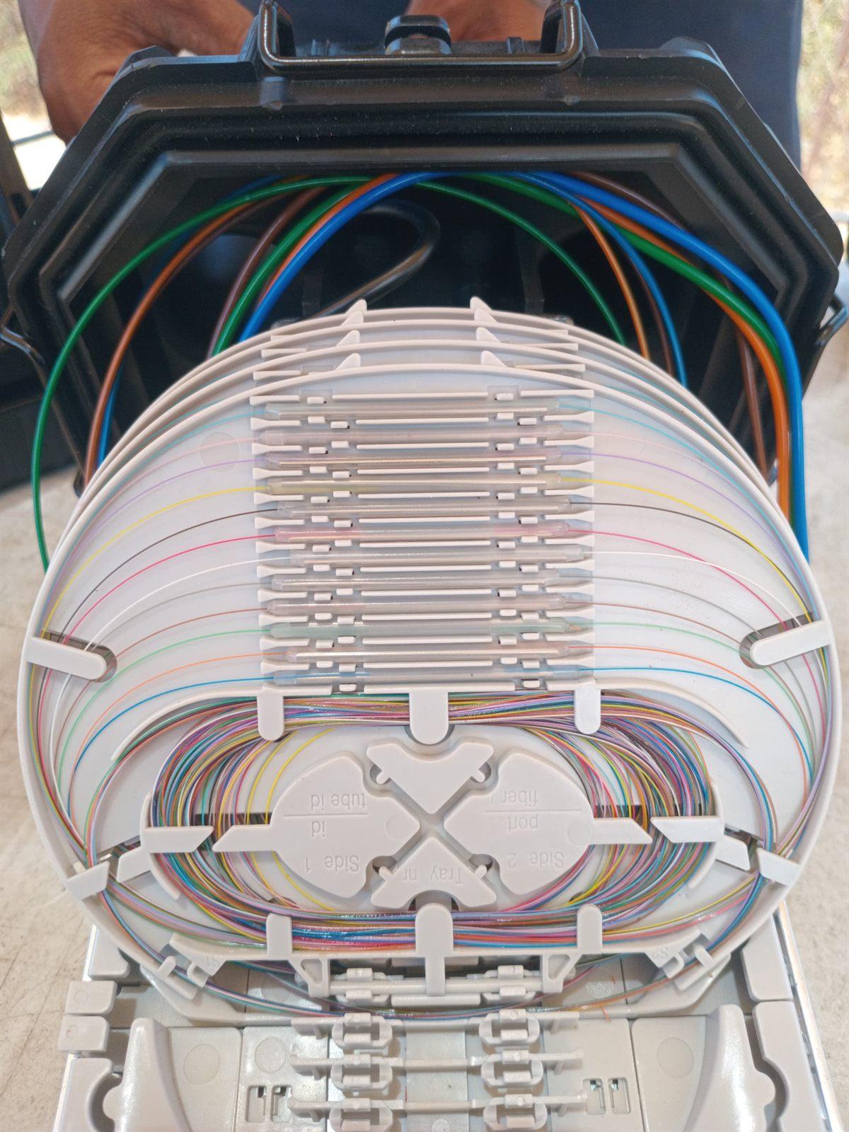 Fibre splicing technician at work